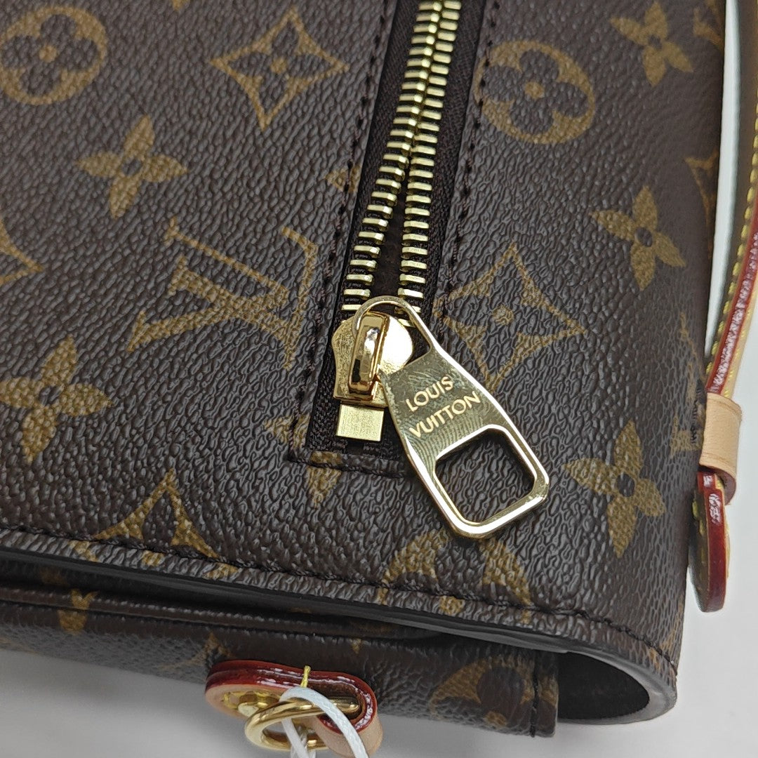 MÉTIS MM Monogram Coated Canvas Brown