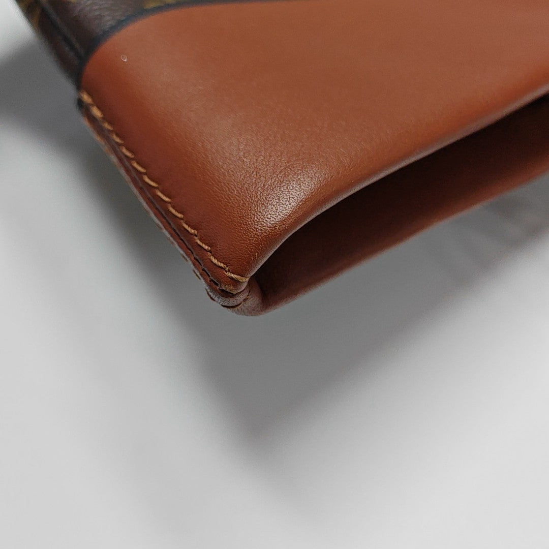 TUILERIES Monogram Coated Canvas Brown