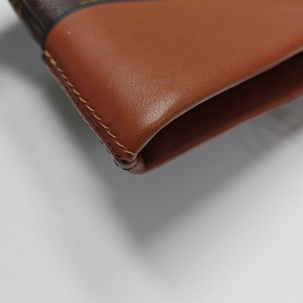 TUILERIES Monogram Coated Canvas Brown