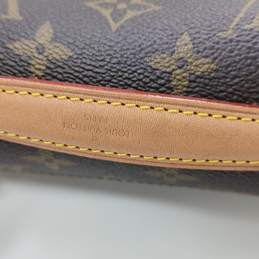 MÉTIS EAST WEST Monogram Coated Canvas Brown