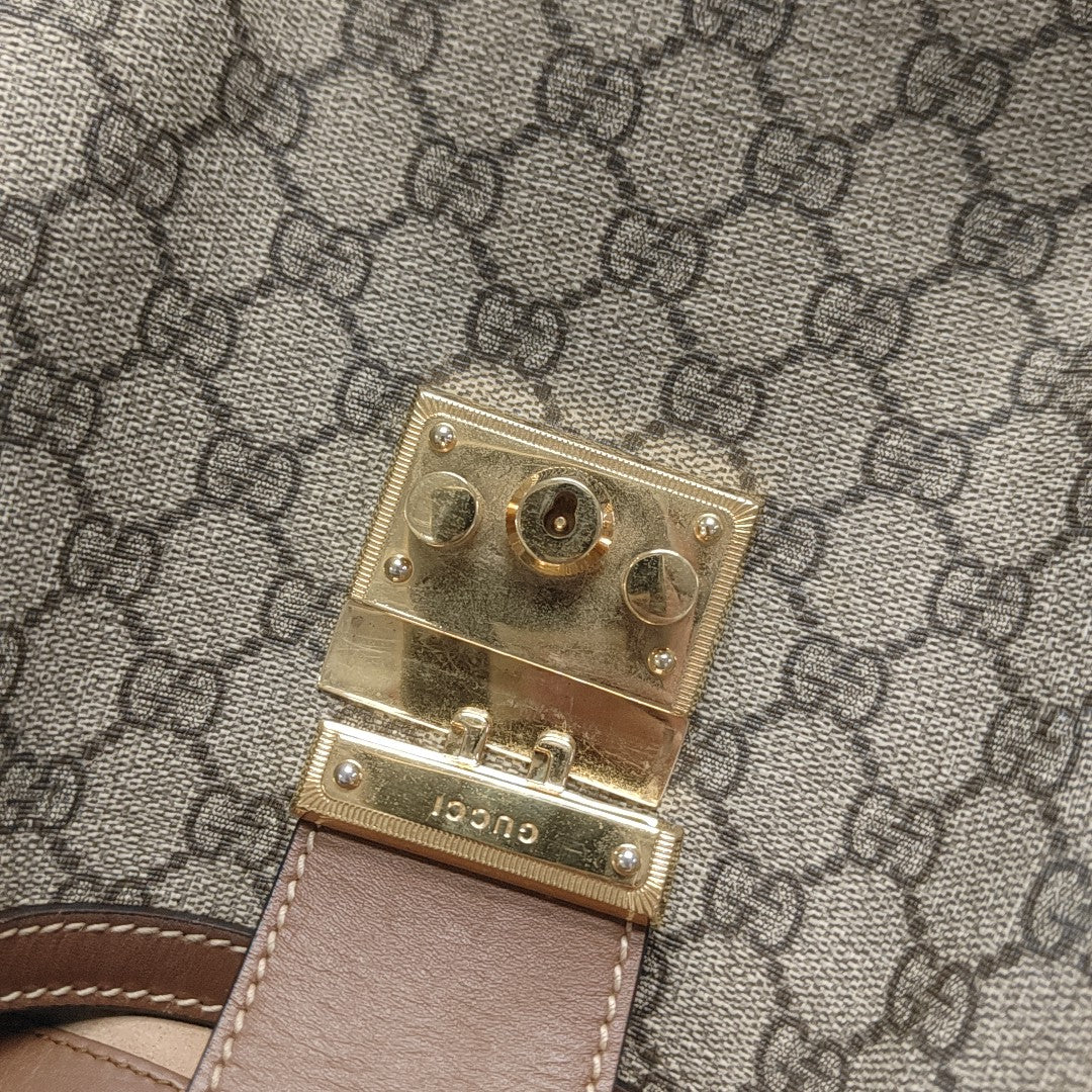 Padlock Medium Monogram Coated Canvas Beige