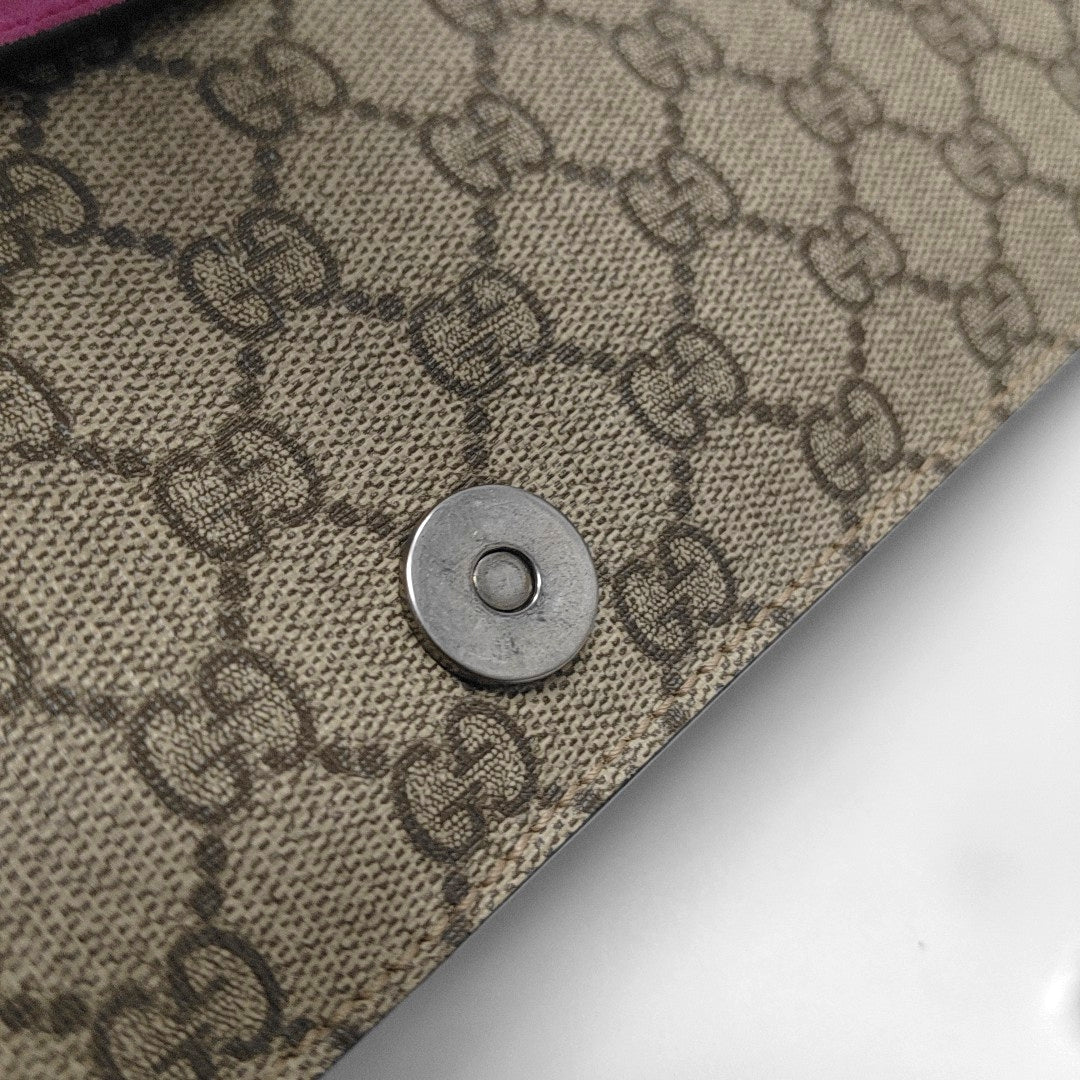 Authenticated pre-owned  Dionysus Monogram Coated Canvas Beige - Clutch at Looply