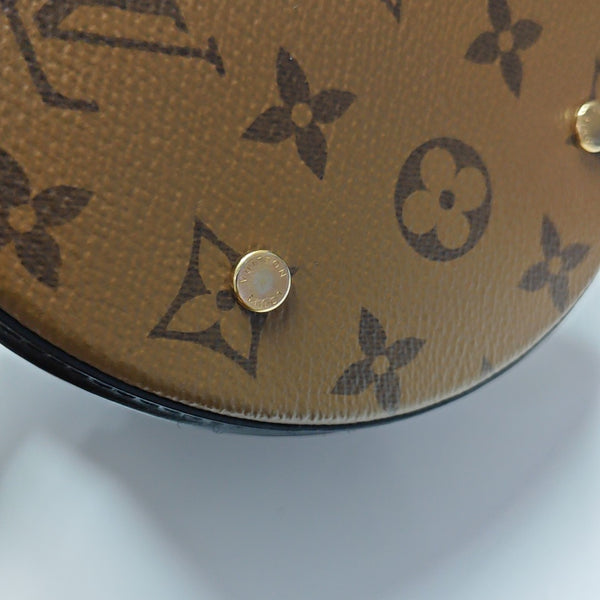 CANNES PM Monogram Coated Canvas Brown