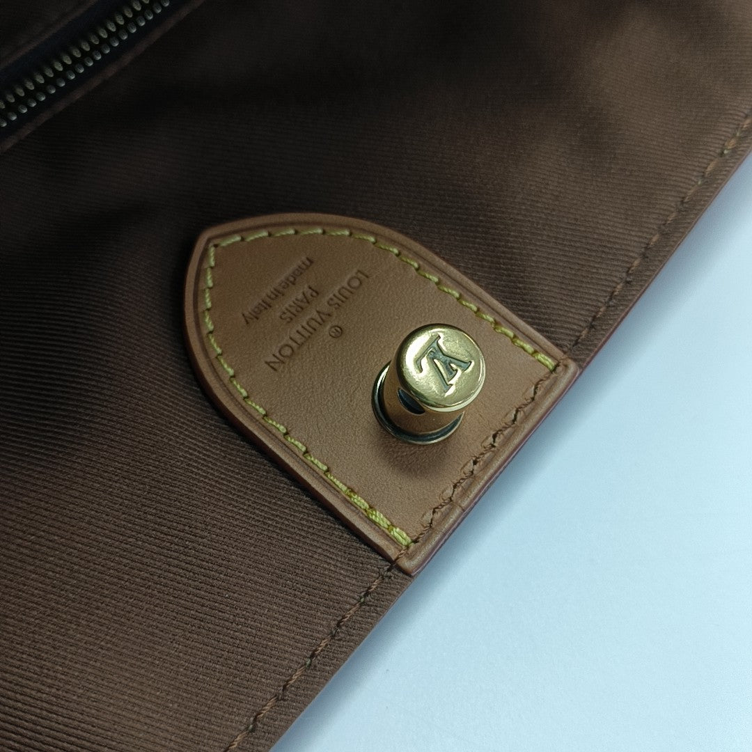 CABAS VOYAGE PM Monogram Coated Canvas Brown