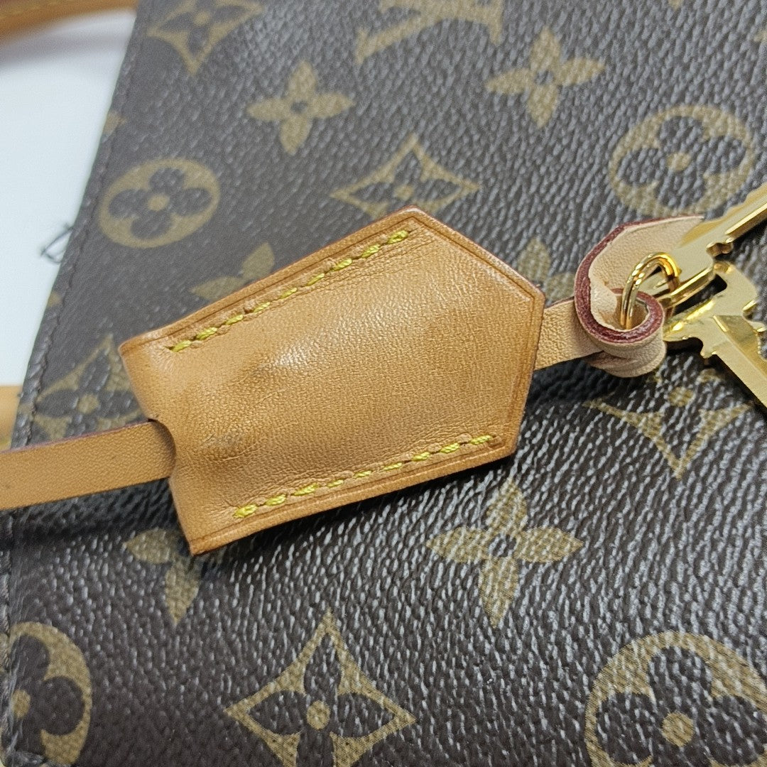 MONTAIGNE Monogram Coated Canvas Brown