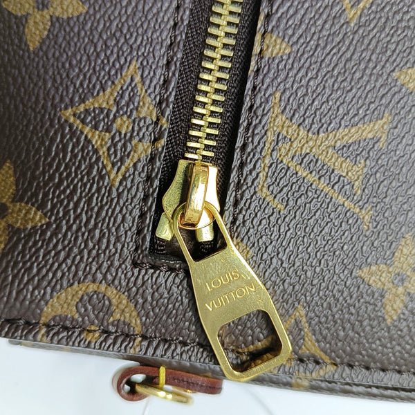 MÉTIS MM Monogram Coated Canvas Brown
