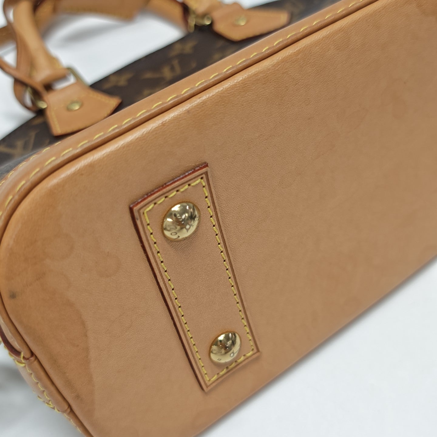 ALMA BB Monogram Coated Canvas Brown
