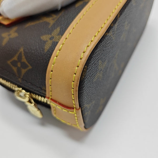 ALMA Mini Monogram Coated Canvas Brown