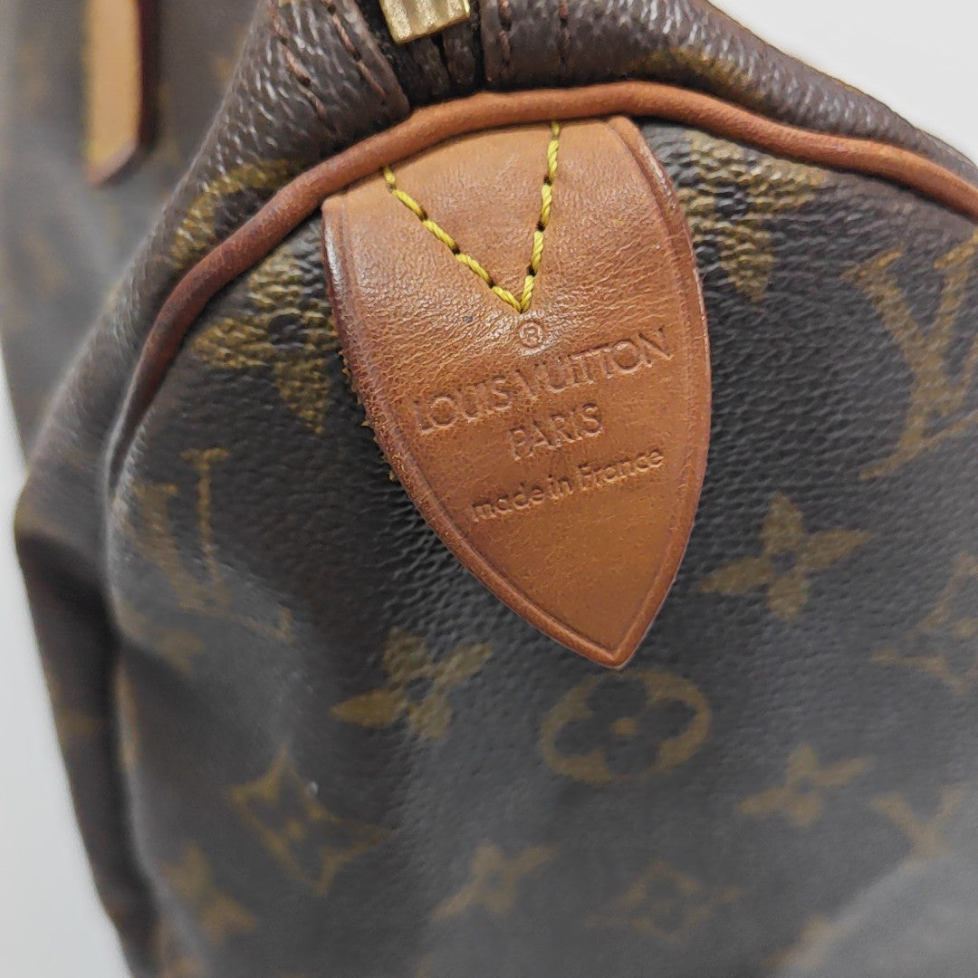 SPEEDY 30 Monogram Coated Canvas Brown