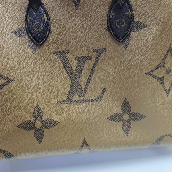 ONTHEGO MM Monogram Coated Canvas Brown