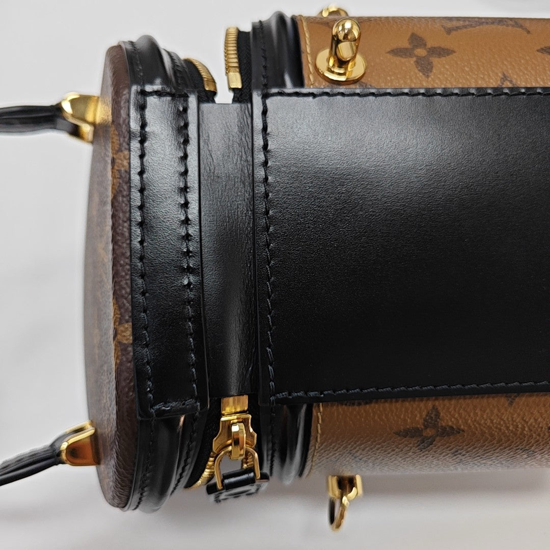 CANNES PM Monogram Coated Canvas Brown