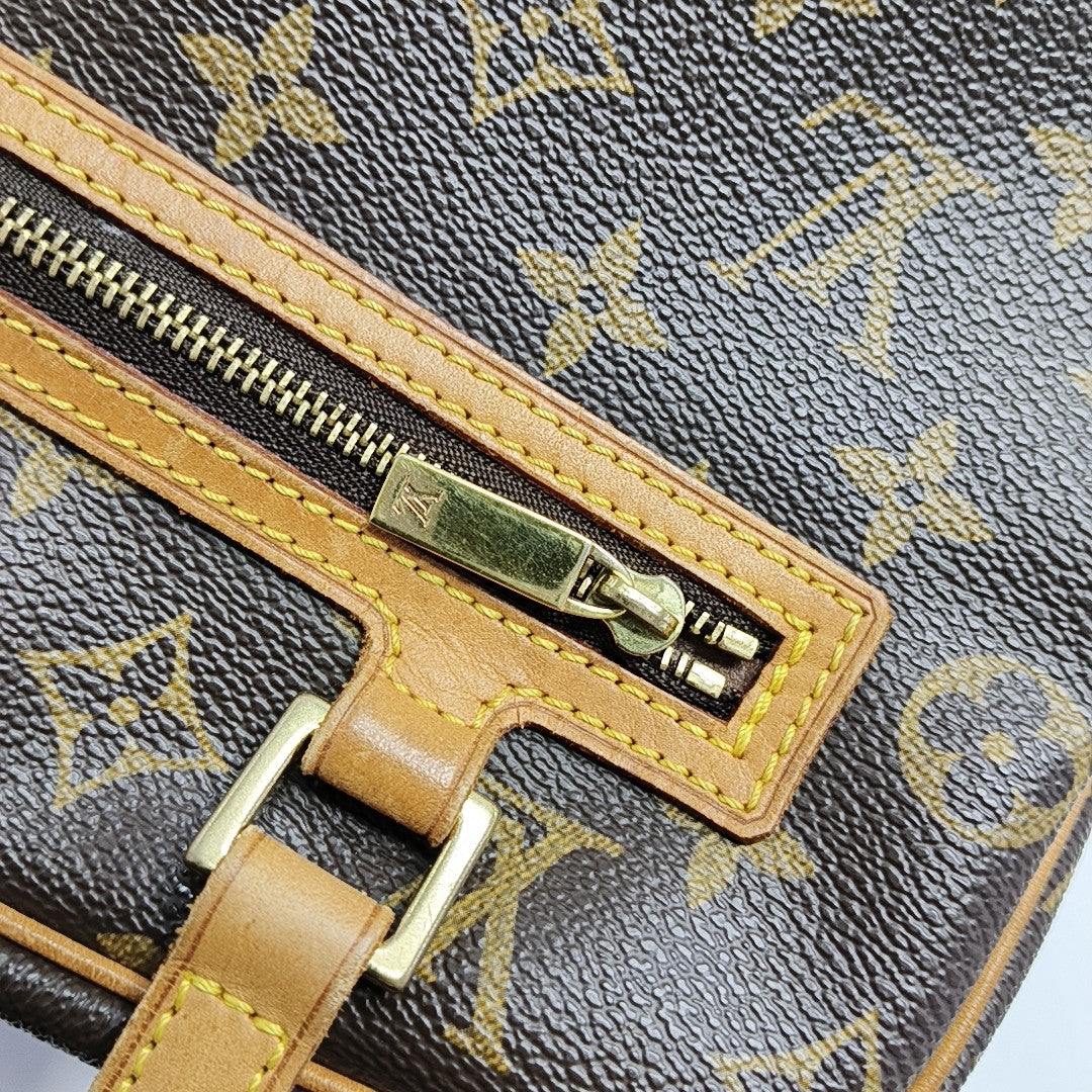 CITE MM Monogram Coated Canvas Brown