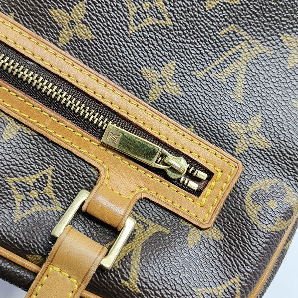 CITE MM Monogram Coated Canvas Brown