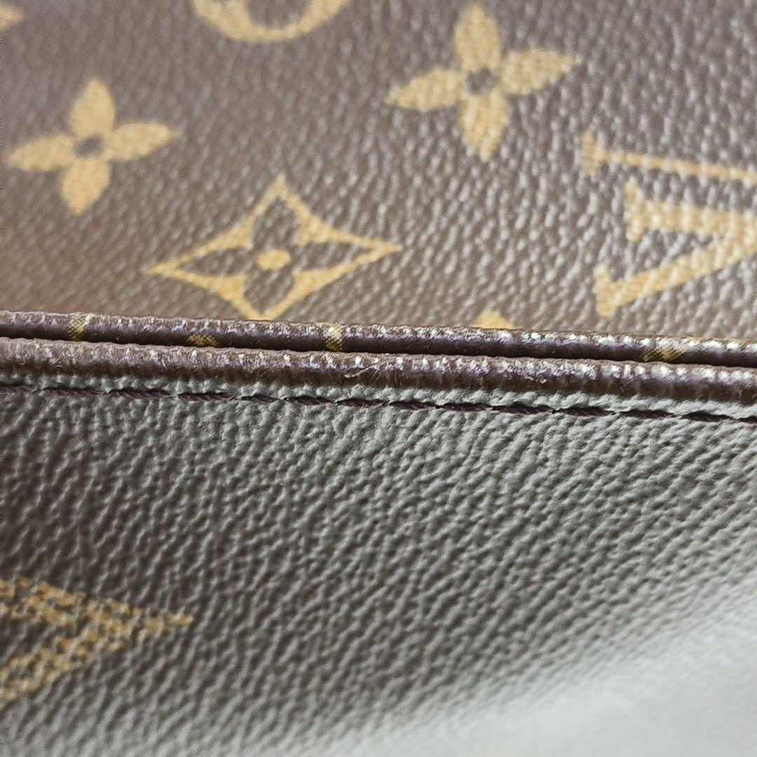 ONTHEGO MM Monogram Coated Canvas Brown