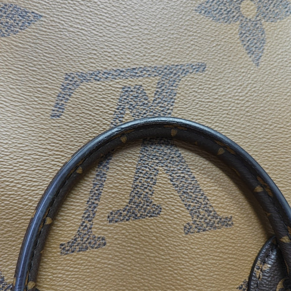ONTHEGO MM Monogram Coated Canvas Brown