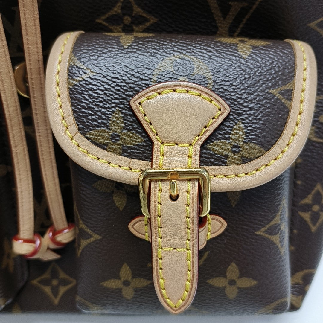 EXCURSION PM Monogram Coated Canvas Brown