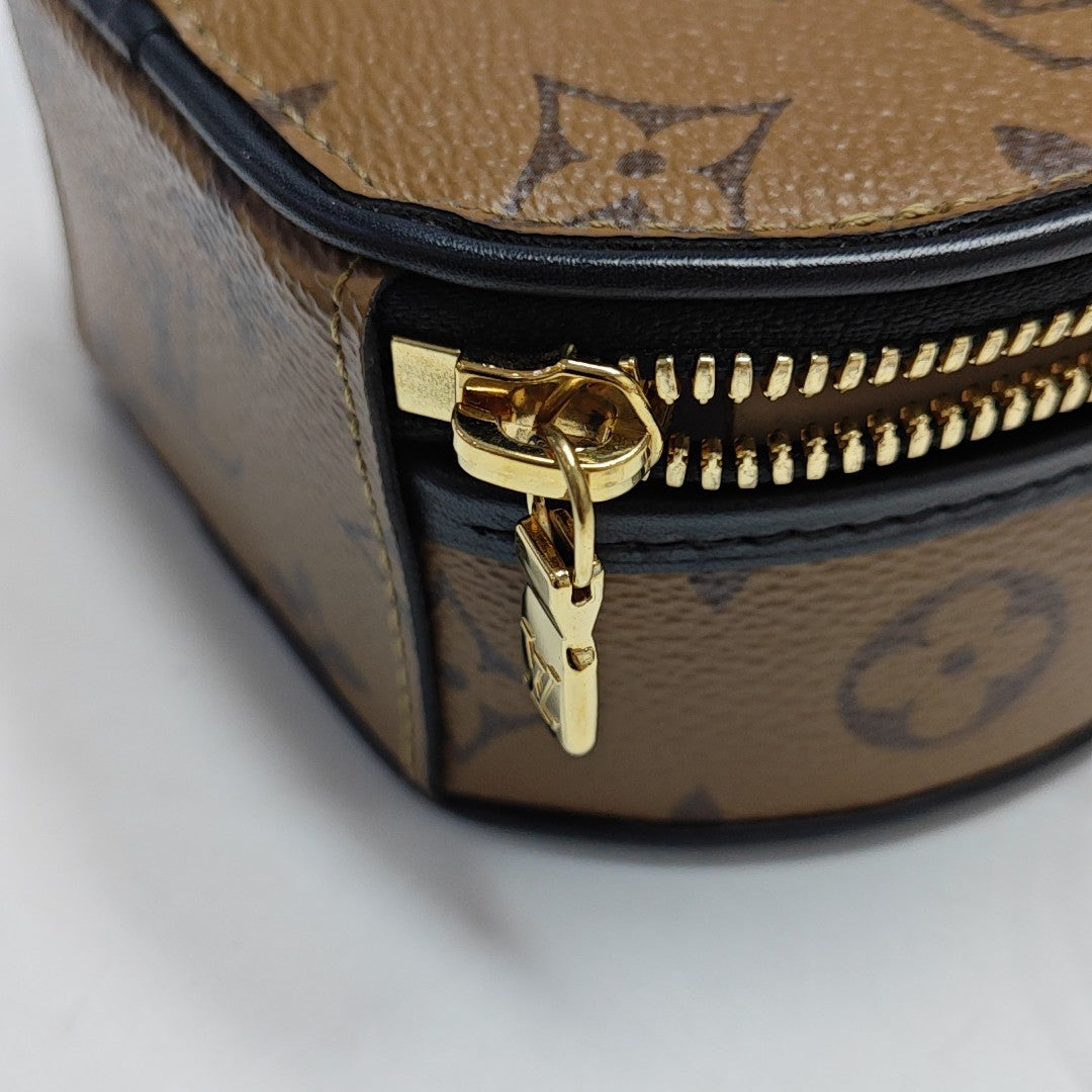 BOITE CHAPEAU Mini Monogram Coated Canvas Brown