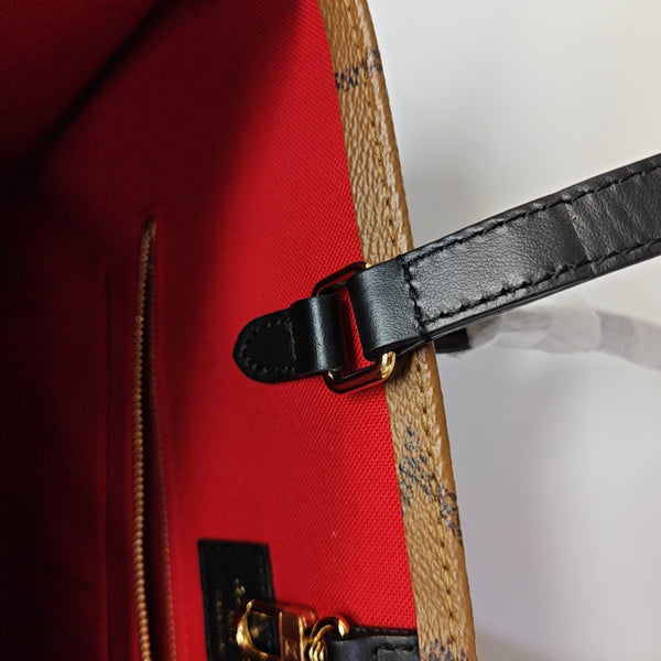 ONTHEGO MM Monogram Coated Canvas Brown