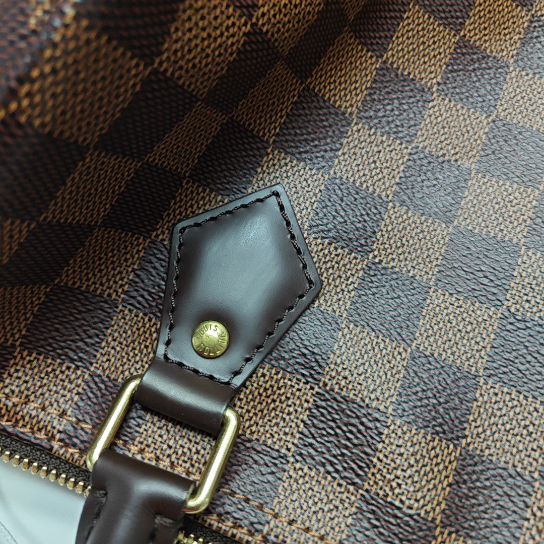 SPEEDY 25 Damier Ebene Coated Canvas Brown