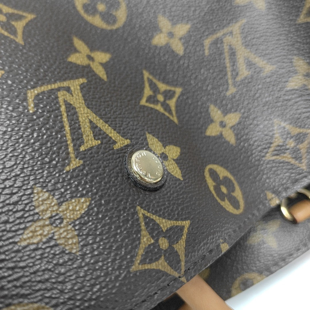 MONTAIGNE Monogram Coated Canvas Brown