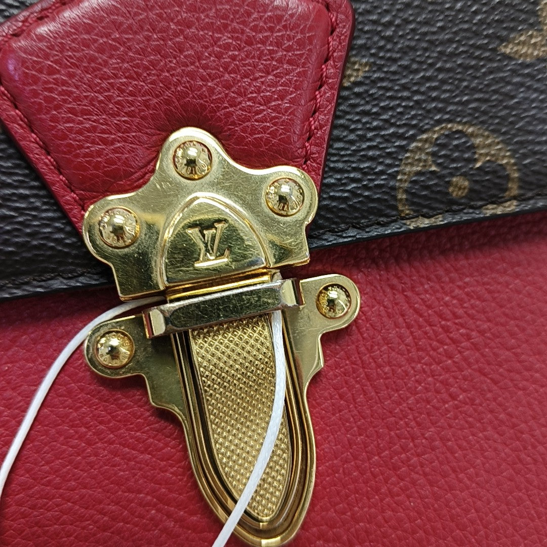 VICTOIRE Monogram Coated Canvas Brown