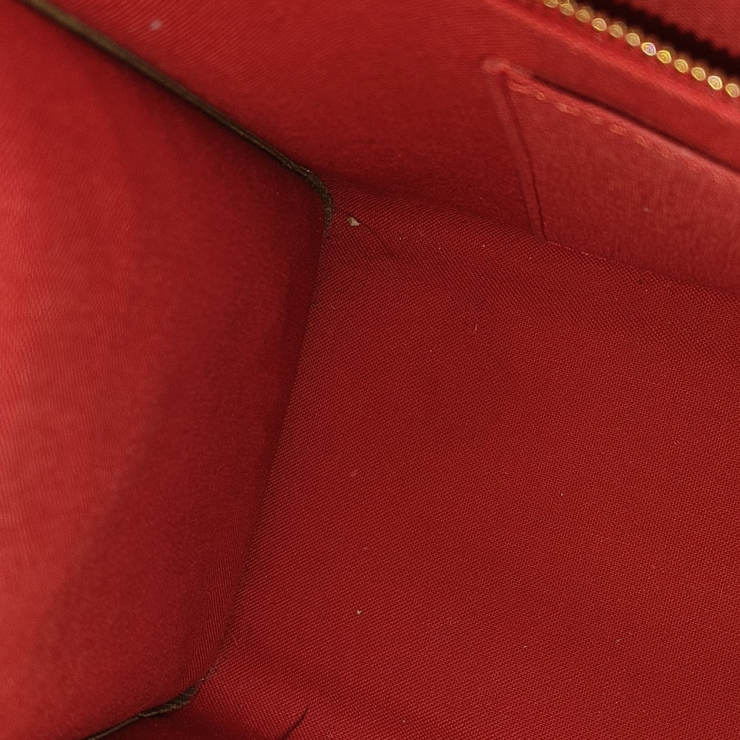 ONTHEGO MM Monogram Coated Canvas Brown