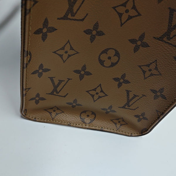 ONTHEGO MM Monogram Coated Canvas Brown