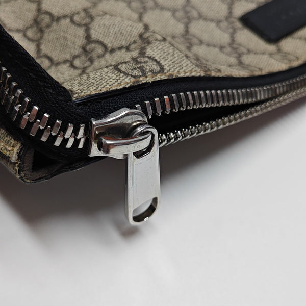 Monogram Coated Canvas Clutch Brown