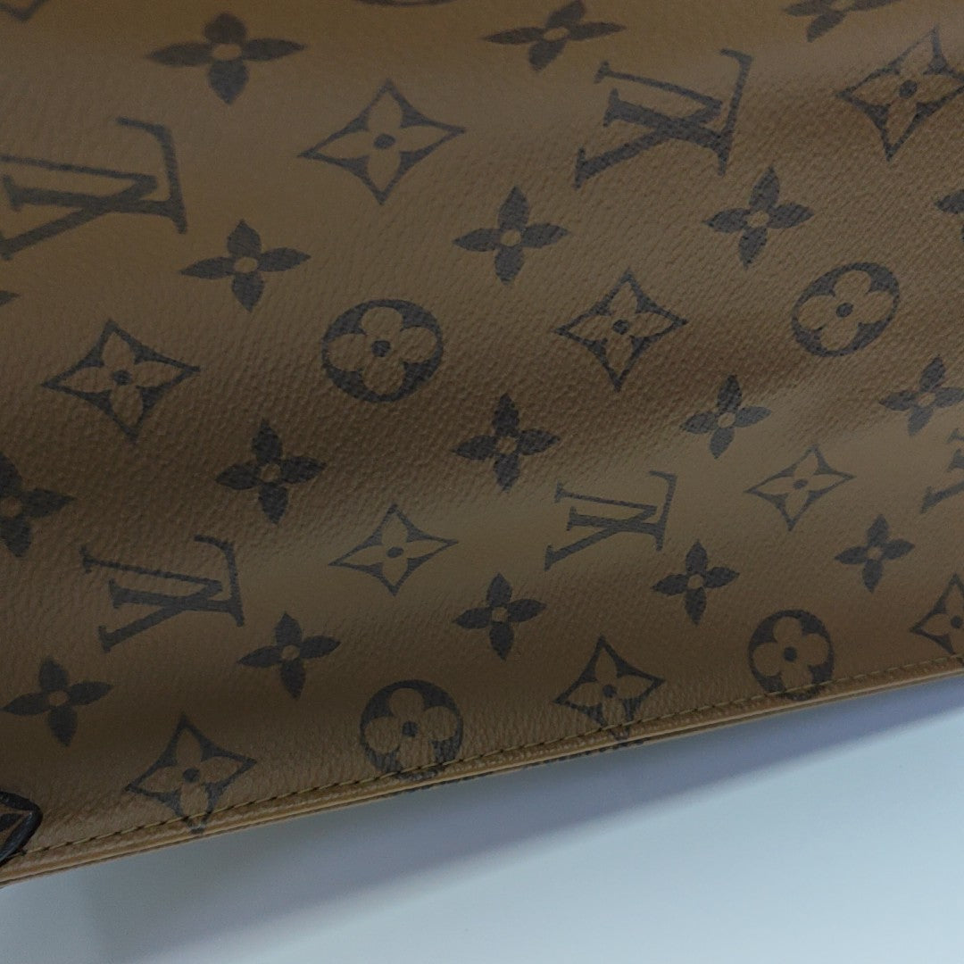 ONTHEGO GM Monogram Coated Canvas Brown