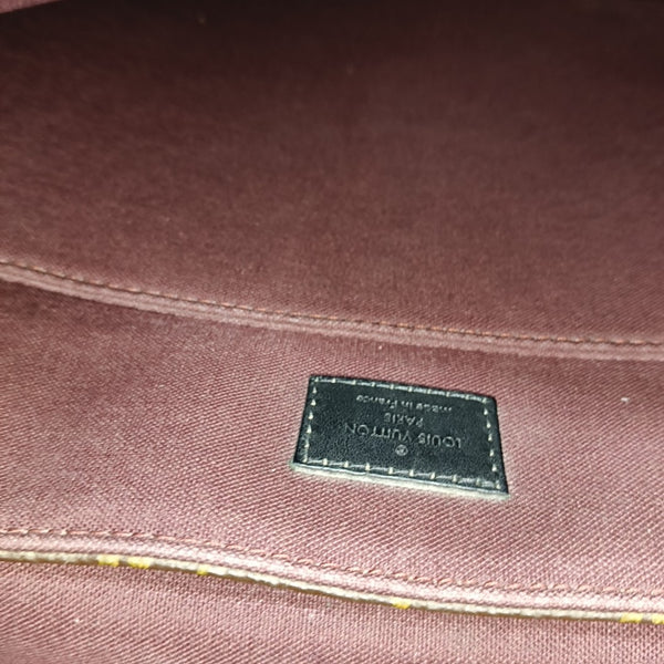 BASS Monogram Coated Canvas Brown