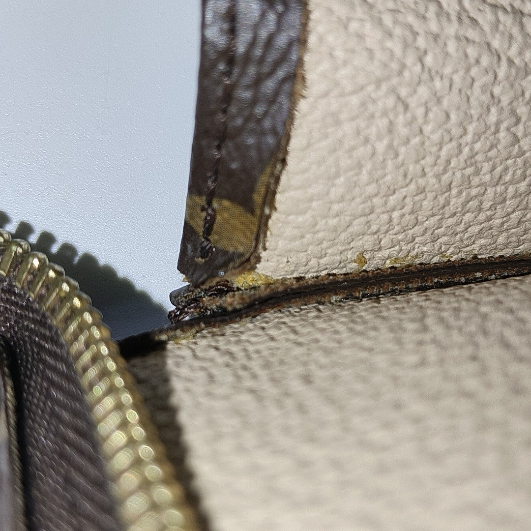 TOILET POCKET 26 Monogram Coated Canvas Brown