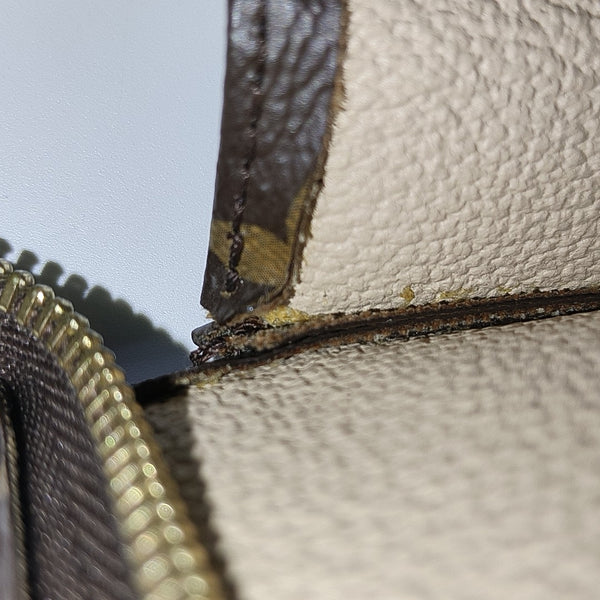 TOILET POCKET 26 Monogram Coated Canvas Brown