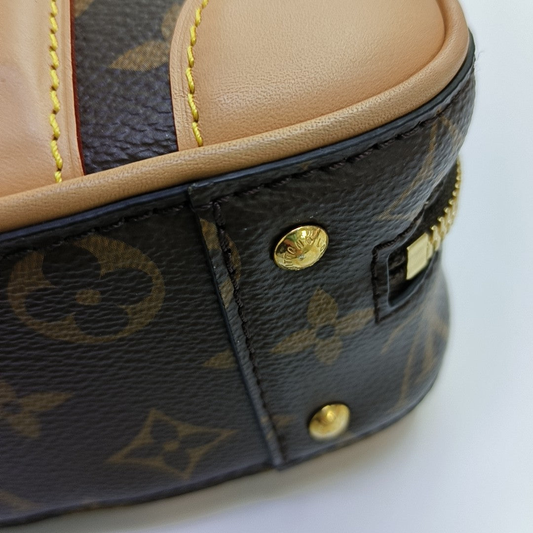 LUGGAGE Monogram Coated Canvas Brown