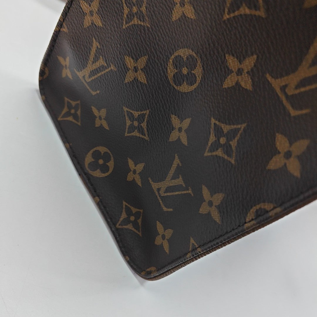 ONTHEGO MM Monogram Coated Canvas Brown