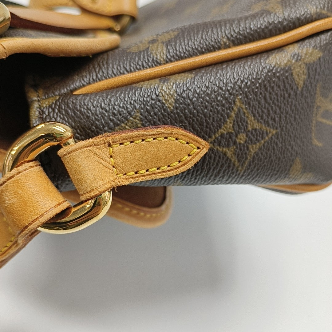 TIKAL Monogram Coated Canvas Brown
