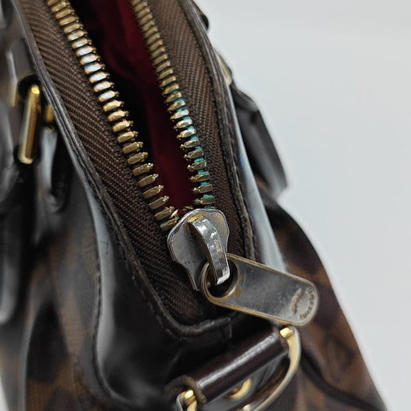 TREVI PM Damier Ebene Coated Canvas Brown