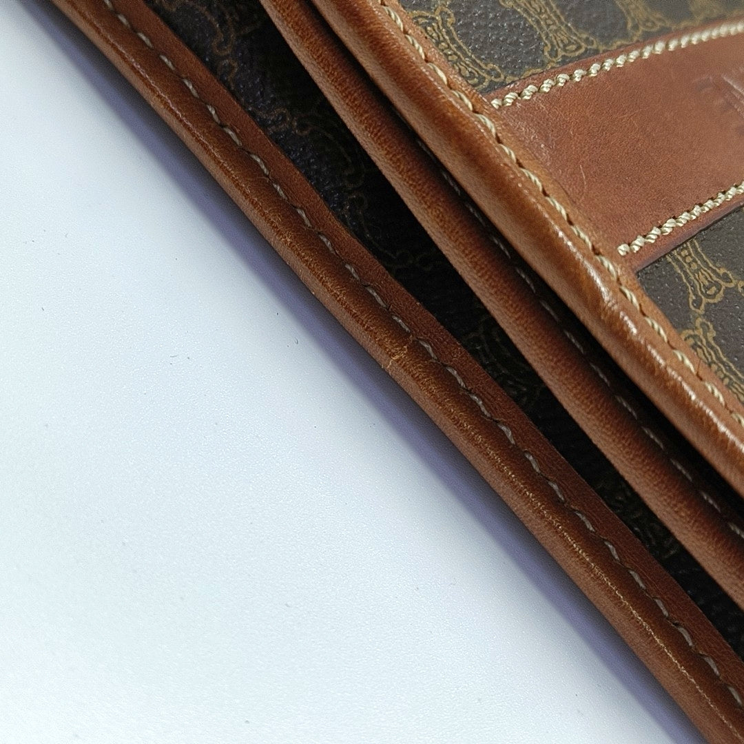 TRIOMPHE ROUND Coated Canvas Brown