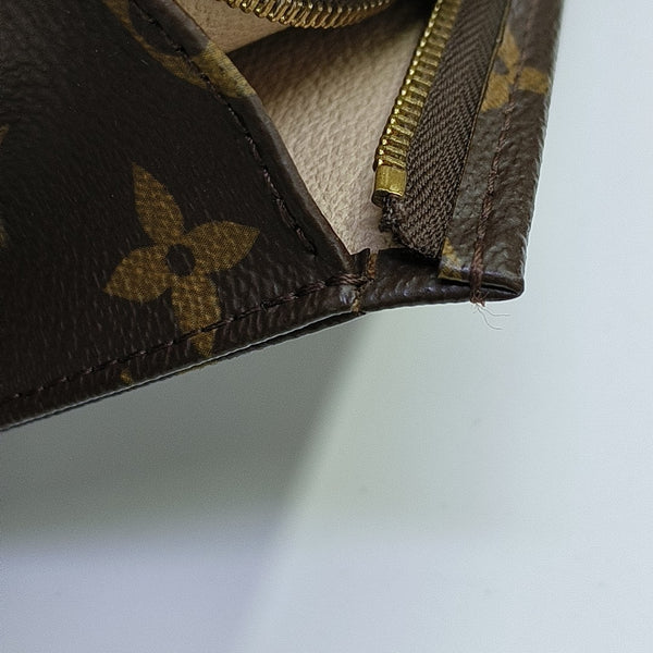 TOILET POCKET 19 Monogram Coated Canvas Brown