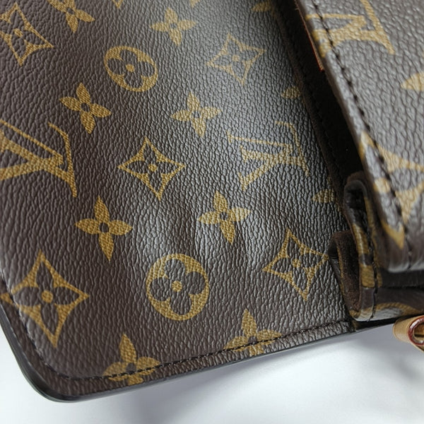 MÉTIS EAST WEST Monogram Coated Canvas Brown