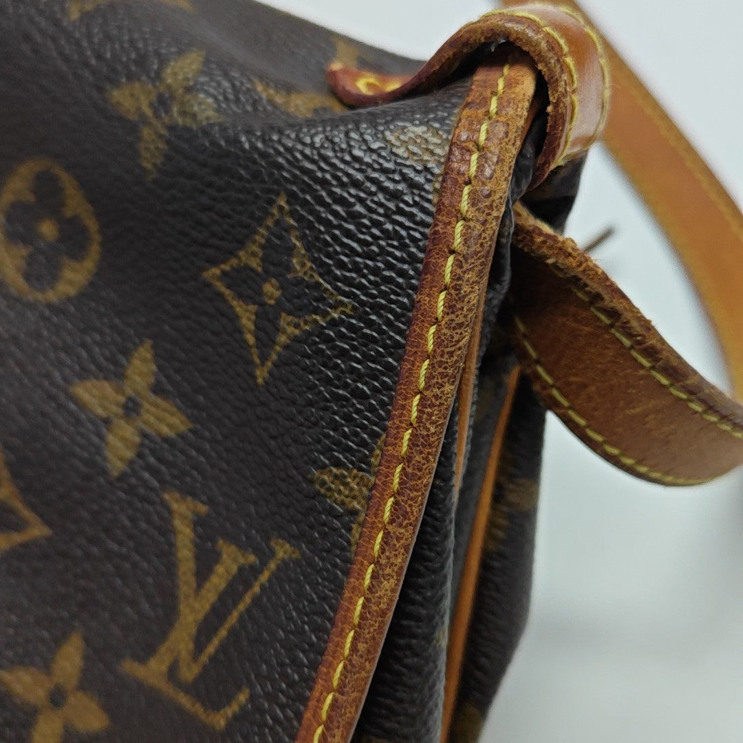 SAUMUR Monogram Coated Canvas Brown