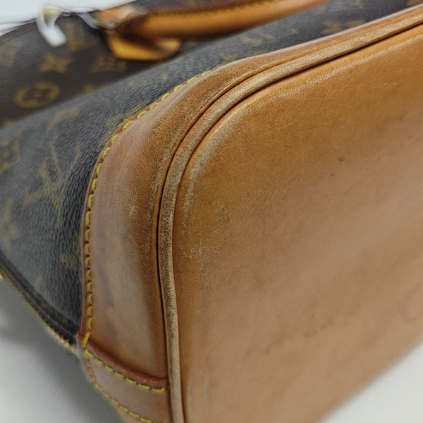 ALMA PM Monogram Coated Canvas Brown
