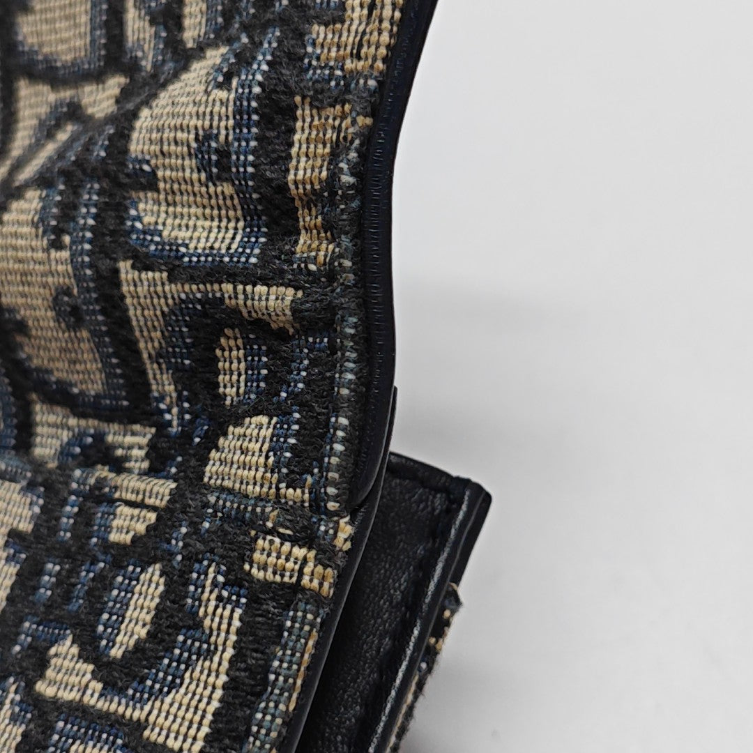 Authenticated pre-owned  Saddle Monogram Fabric Blue Card Holder - Card Holder at Looply