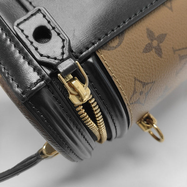 CANNES PM Monogram Coated Canvas Brown
