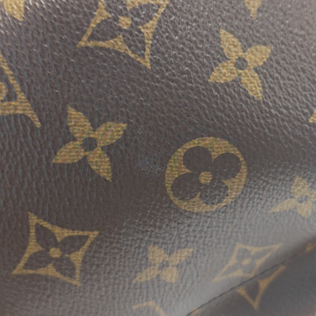 Monogram Coated Canvas Backpack Brown