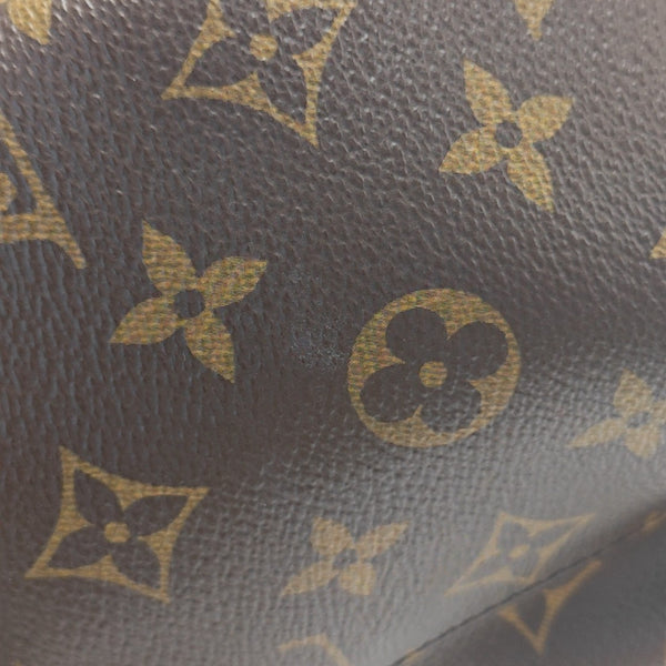 Monogram Coated Canvas Backpack Brown