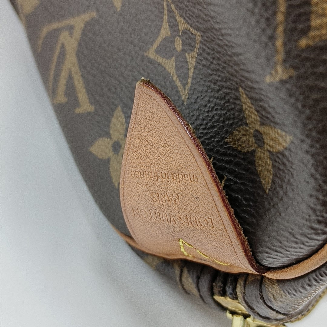 SPEEDY 25 Monogram Coated Canvas Brown