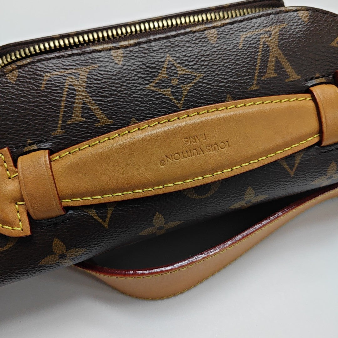 RUSH Monogram Coated Canvas Brown
