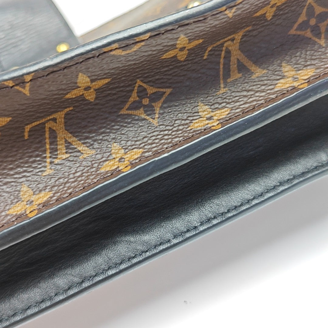 TRUNK Monogram Coated Canvas Brown