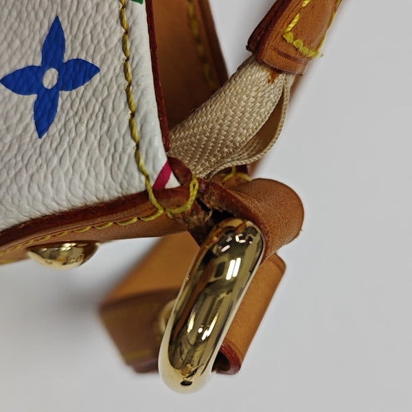 LV × TM ELIZA Monogram Coated Canvas White