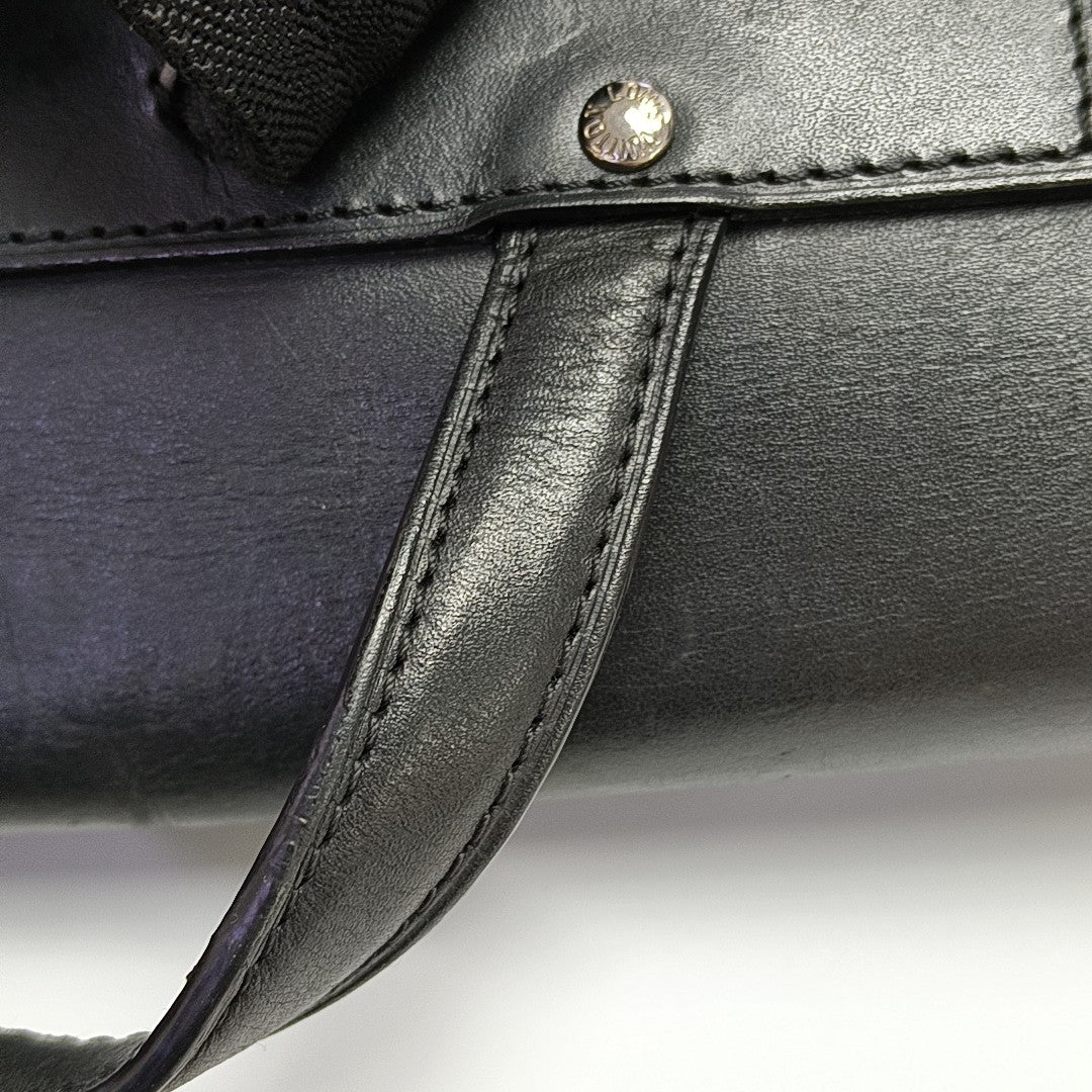 PALK Monogram Coated Canvas Brown